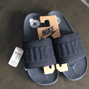 Brand new Nike slip ons